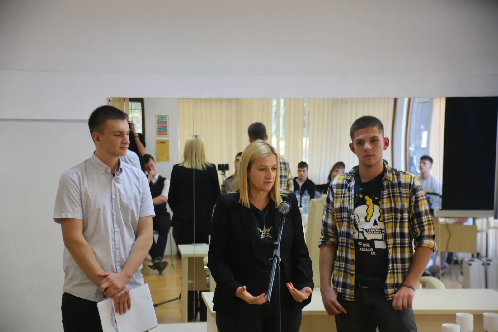 Young developers with a guest speaker at a Po Sushtestvo event